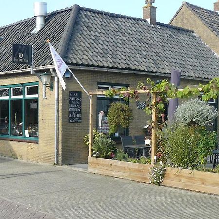 Eetcafe/Pension Nooitgedacht Strijen Exteriör bild